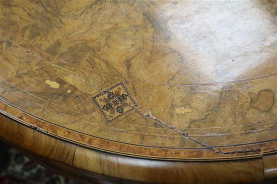 A Victorian walnut demi lune card table W.93cm